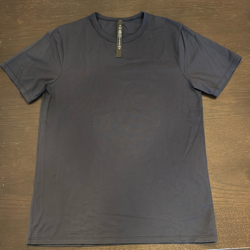 Lululemon men’s cotton short sleeved shirt. Size small. Navy. Like new.